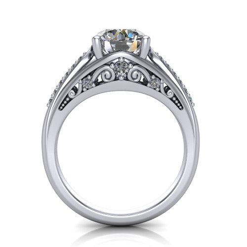 Blakely round solitaire engagement ring in 18K White Gold, through-finger front profile showing the filigree under-gallery and split shank from the front