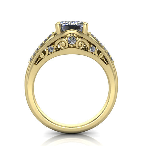 Blakely emerald-cut solitaire engagement ring in 18K Yellow Gold, through-finger front profile showing the filigree under-gallery and split shank from the front