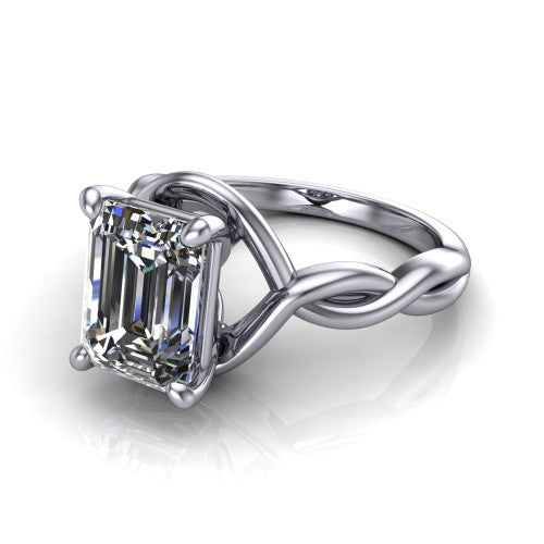 Norah emerald-cut classic engagement ring in Platinum, three-quarter perspective showing the emerald-cut center diamond above a twisted infinity love-knot band