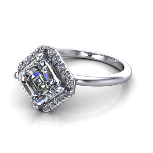 Callie square emerald-cut halo engagement ring in Platinum, three-quarter perspective showing the square emerald-cut center diamond set diagonally in a pave halo on a thin band