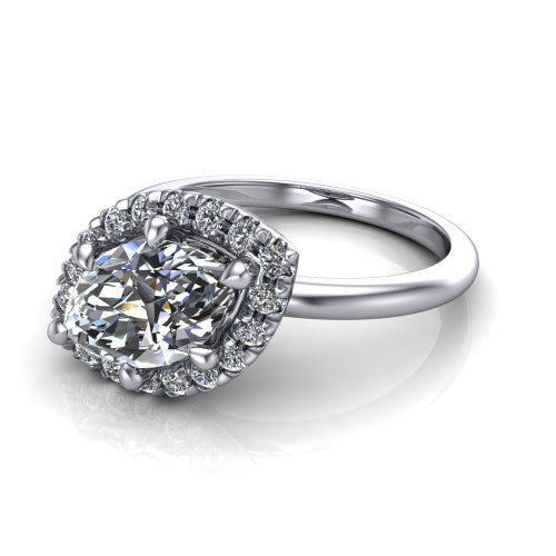 Callie marquise halo engagement ring in Platinum, three-quarter perspective showing the marquise center diamond set diagonally in a pave halo on a thin band