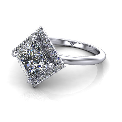Callie princess-cut halo engagement ring in Platinum, three-quarter perspective showing the princess-cut center diamond set diagonally in a pave halo on a thin band