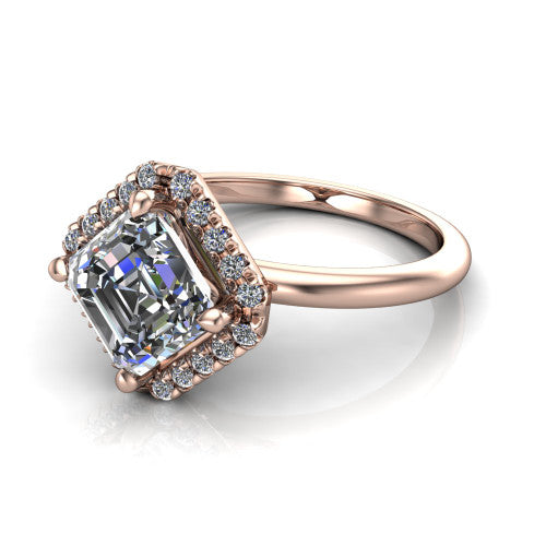 Callie square emerald-cut halo engagement ring in 14K Rose Gold, three-quarter perspective showing the square emerald-cut center diamond set diagonally in a pave halo on a thin band