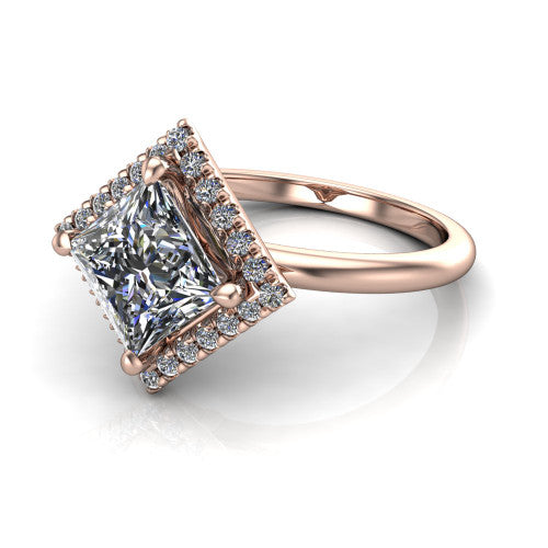 Callie princess-cut halo engagement ring in 18K Rose Gold, three-quarter perspective showing the princess-cut center diamond set diagonally in a pave halo on a thin band