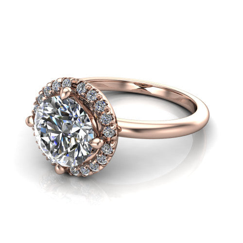 Callie round halo engagement ring in 18K Rose Gold, three-quarter perspective showing the round center diamond set diagonally in a pave halo on a thin band