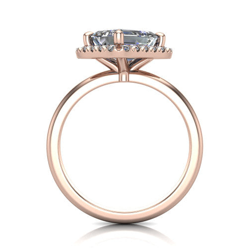 Callie emerald-cut halo engagement ring in 18K Rose Gold, through-finger front profile showing the pave halo and thin band from the front