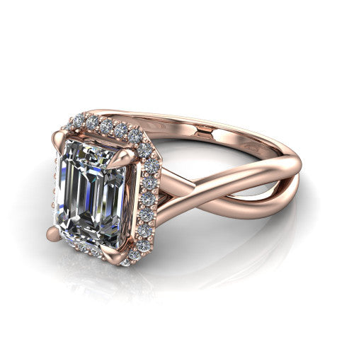 Molly emerald-cut halo engagement ring in 14K Rose Gold, three-quarter perspective showing the emerald-cut center diamond in a pave halo above a twisted infinity band