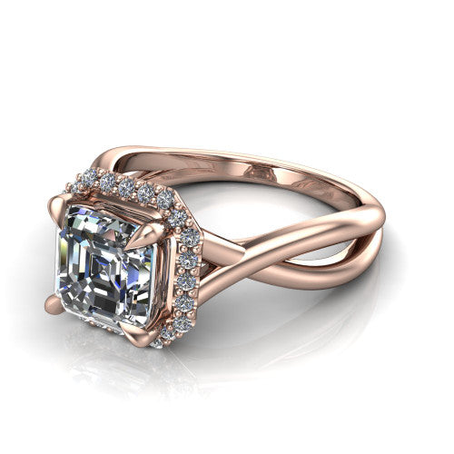 Molly square emerald-cut halo engagement ring in 18K Rose Gold, three-quarter perspective showing the square emerald-cut center diamond in a pave halo above a twisted infinity band