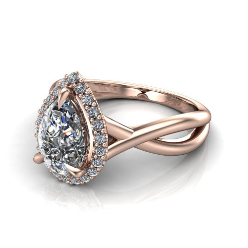 Molly pear halo engagement ring in 14K Rose Gold, three-quarter perspective showing the pear center diamond in a pave halo above a twisted infinity band