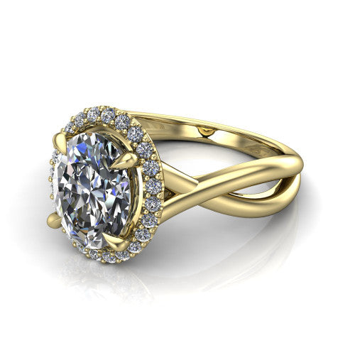 Molly oval halo engagement ring in 14K Yellow Gold, three-quarter perspective showing the oval center diamond in a pave halo above a twisted infinity band