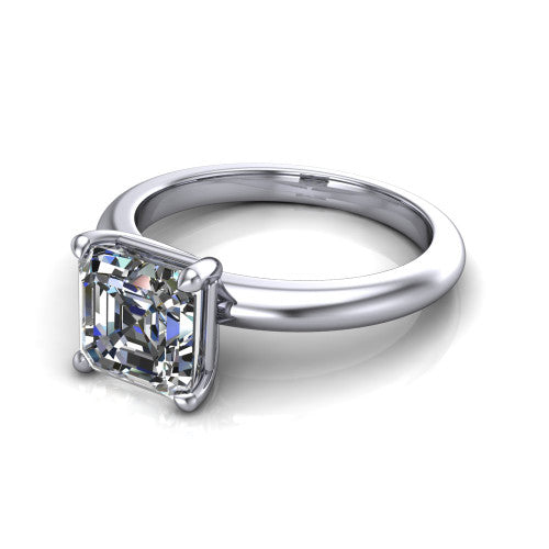 Noelle square emerald classic solitaire engagement ring in 18K White Gold, three-quarter perspective showing the prong-set center raised above a slim plain polished band