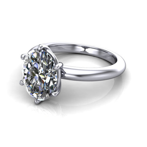 Noelle oval classic solitaire engagement ring in 14K White Gold, three-quarter perspective showing the prong-set center raised above a slim plain polished band