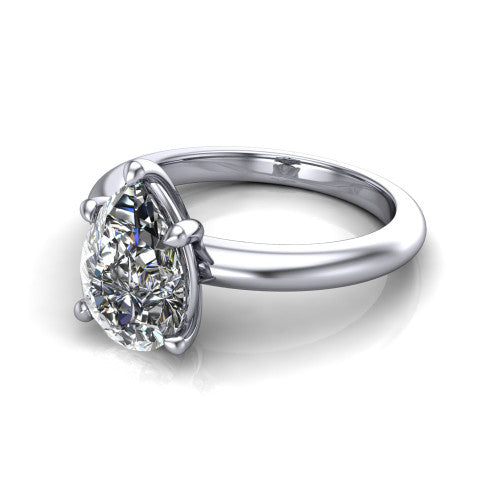 Noelle pear classic solitaire engagement ring in 14K White Gold, three-quarter perspective showing the prong-set center raised above a slim plain polished band
