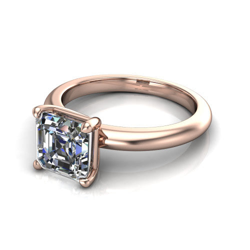 Noelle square emerald classic solitaire engagement ring in 18K Rose Gold, three-quarter perspective showing the prong-set center raised above a slim plain polished band
