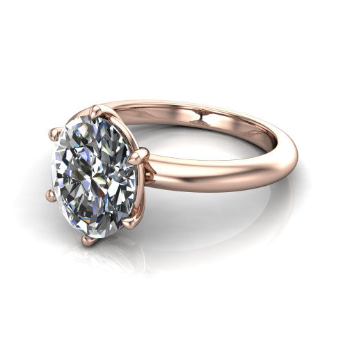 Noelle oval classic solitaire engagement ring in 14K Rose Gold, three-quarter perspective showing the prong-set center raised above a slim plain polished band
