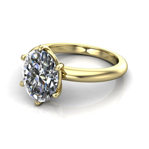 Noelle oval classic solitaire engagement ring in 14K Yellow Gold, three-quarter perspective showing the prong-set center raised above a slim plain polished band