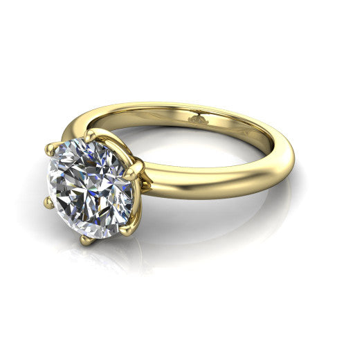 Noelle round classic solitaire engagement ring in 14K Yellow Gold, three-quarter perspective showing the prong-set center raised above a slim plain polished band