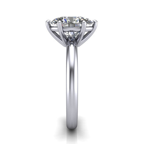 Noelle oval classic solitaire engagement ring in 18K White Gold, side profile showing the plain polished band and the prong setting in profile