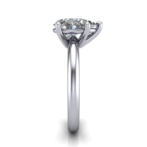 Noelle pear classic solitaire engagement ring in 14K White Gold, side profile showing the plain polished band and the prong setting in profile