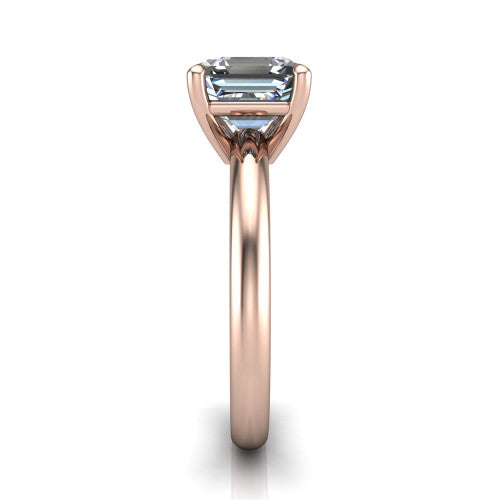 Noelle square emerald classic solitaire engagement ring in 18K Rose Gold, side profile showing the plain polished band and the prong setting in profile