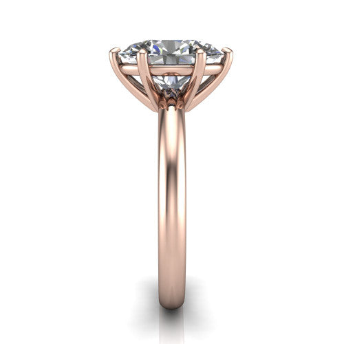 Noelle oval classic solitaire engagement ring in 18K Rose Gold, side profile showing the plain polished band and the prong setting in profile