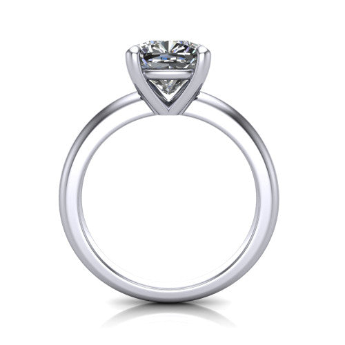 Noelle cushion classic solitaire engagement ring in Platinum, through-finger front profile showing the prong head raised above the plain shank