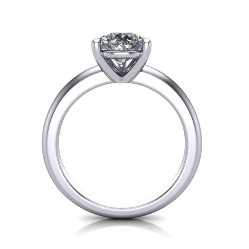 Noelle pear classic solitaire engagement ring in 18K White Gold, through-finger front profile showing the prong head raised above the plain shank