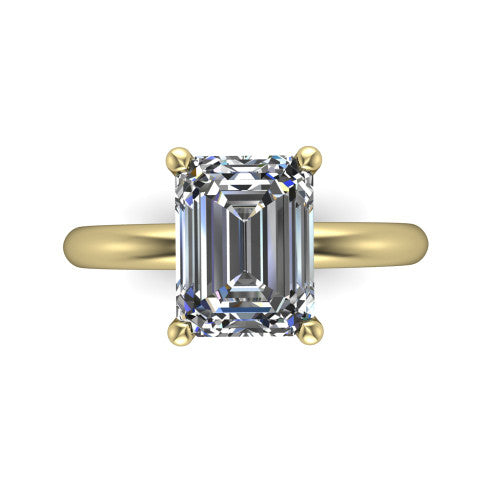 Noelle emerald classic solitaire engagement ring in 14K Yellow Gold, top-down view showing the center stone and the smooth band from above