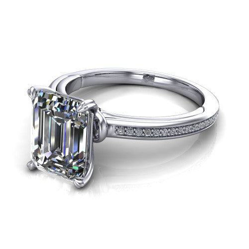 Kimberly emerald-cut classic engagement ring in 14K White Gold, three-quarter perspective showing the emerald-cut center diamond in a four-prong head above a thin pave band
