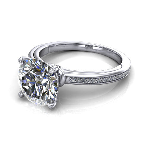 Kimberly round classic engagement ring in 14K White Gold, three-quarter perspective showing the round center diamond in a four-prong head above a thin pave band