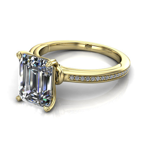 Kimberly emerald-cut classic engagement ring in 18K Yellow Gold, three-quarter perspective showing the emerald-cut center diamond in a four-prong head above a thin pave band