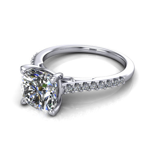 Milani cushion-cut classic engagement ring in Platinum, three-quarter perspective showing the cushion-cut center diamond, double-claw prongs, and pavé shoulders