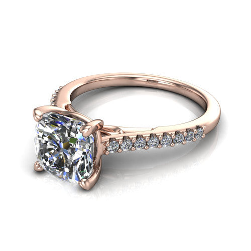 Milani cushion-cut classic engagement ring in 18K Rose Gold, three-quarter perspective showing the cushion-cut center diamond, double-claw prongs, and pavé shoulders