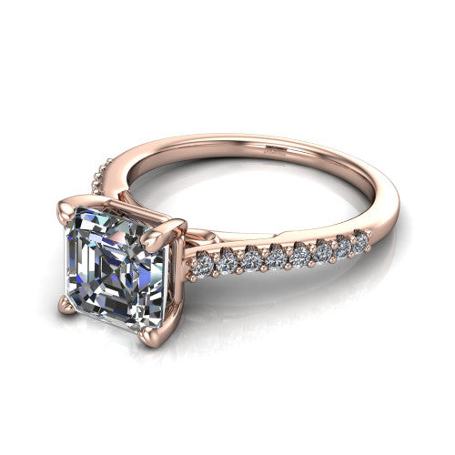 Milani square emerald-cut classic engagement ring in 14K Rose Gold, three-quarter perspective showing the square emerald-cut center diamond, double-claw prongs, and pavé shoulders