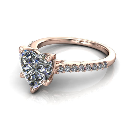 Milani heart-shaped classic engagement ring in 18K Rose Gold, three-quarter perspective showing the heart-shaped center diamond, double-claw prongs, and pavé shoulders