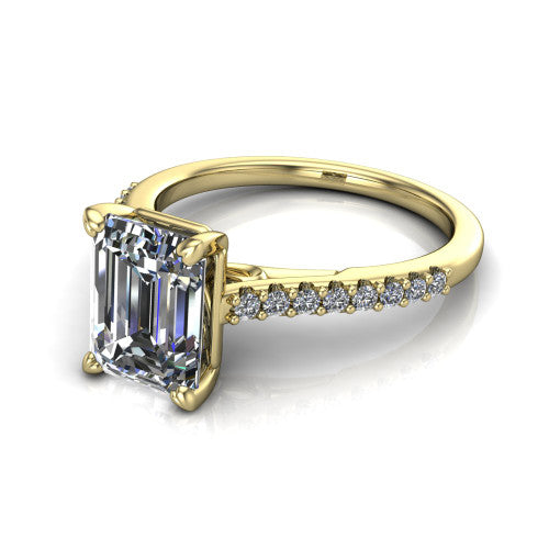 Milani emerald-cut classic engagement ring in 14K Yellow Gold, three-quarter perspective showing the emerald-cut center diamond, double-claw prongs, and pavé shoulders