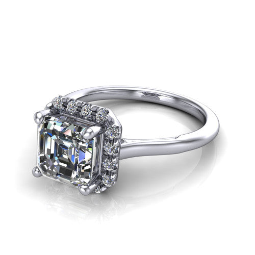 Gemma square emerald-cut halo engagement ring in Platinum, three-quarter perspective showing the square emerald-cut center diamond in a pave halo above a thin band
