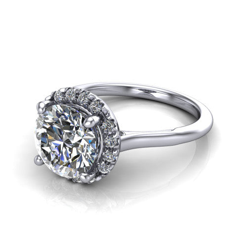 Gemma round halo engagement ring in 14K White Gold, three-quarter perspective showing the round center diamond in a pave halo above a thin band