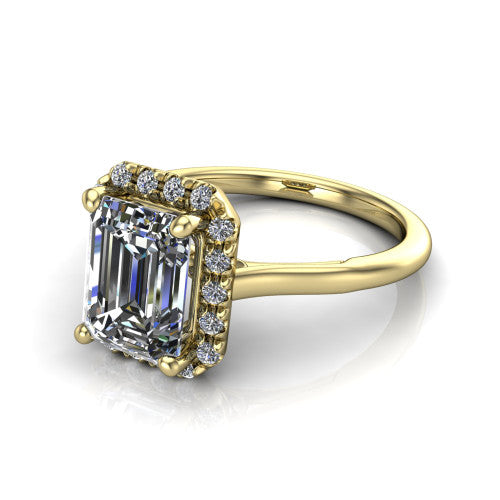 Gemma emerald-cut halo engagement ring in 14K Yellow Gold, three-quarter perspective showing the emerald-cut center diamond in a pave halo above a thin band