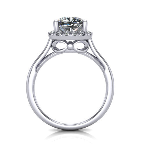 Gemma cushion halo engagement ring in 18K White Gold, through-finger front profile showing the decorative bow gallery and halo from the front