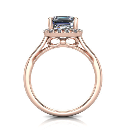 Gemma square emerald-cut halo engagement ring in 14K Rose Gold, through-finger front profile showing the decorative bow gallery and halo from the front