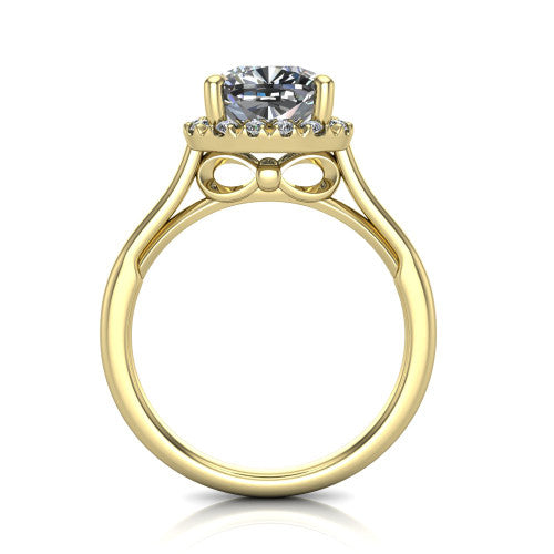 Gemma cushion halo engagement ring in 18K Yellow Gold, through-finger front profile showing the decorative bow gallery and halo from the front