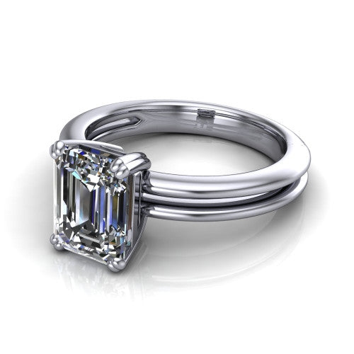 Peyton emerald-cut classic engagement ring in 14K White Gold, three-quarter perspective showing the emerald-cut center diamond, double-claw prongs, and split shank
