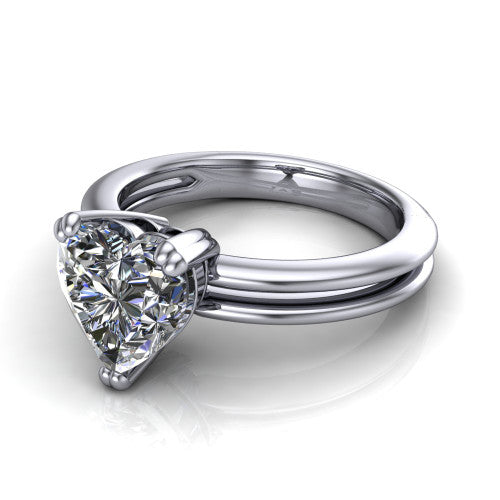 Peyton heart-shaped classic engagement ring in Platinum, three-quarter perspective showing the heart-shaped center diamond, double-claw prongs, and split shank