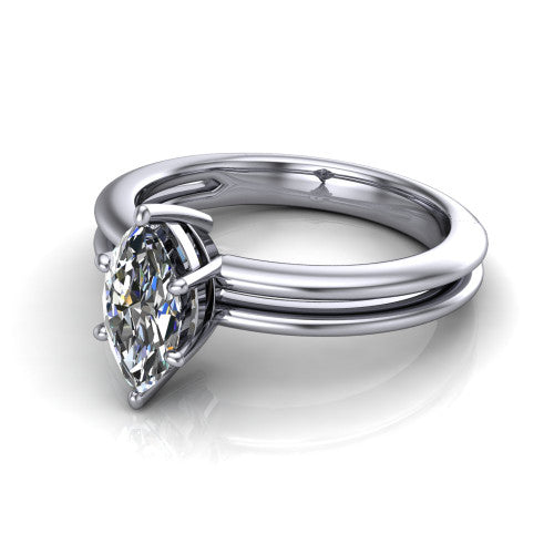 Peyton marquise-cut classic engagement ring in Platinum, three-quarter perspective showing the marquise-cut center diamond, double-claw prongs, and split shank