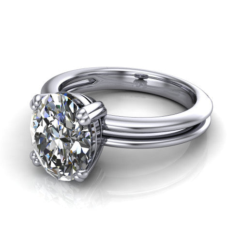 Peyton oval classic engagement ring in Platinum, three-quarter perspective showing the oval center diamond, double-claw prongs, and split shank