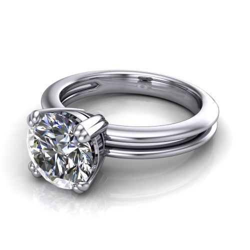 Peyton round solitaire engagement ring in 14K White Gold, three-quarter perspective showing the round center diamond, double-claw prongs, and split shank