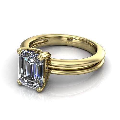 Peyton emerald-cut classic engagement ring in 14K Yellow Gold, three-quarter perspective showing the emerald-cut center diamond, double-claw prongs, and split shank