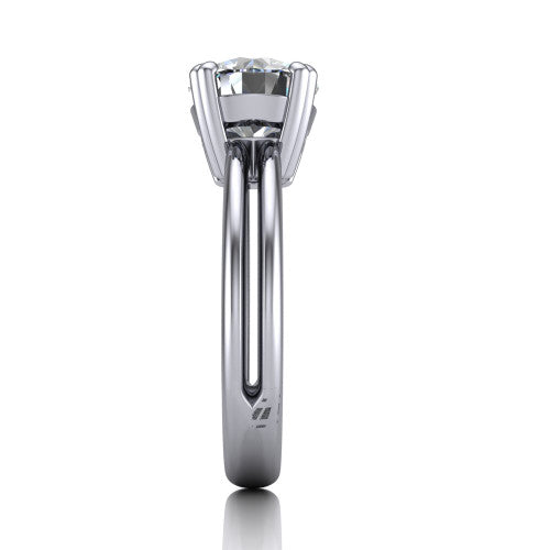 Peyton round solitaire engagement ring in 18K White Gold, side profile showing the split shank dividing into two rails