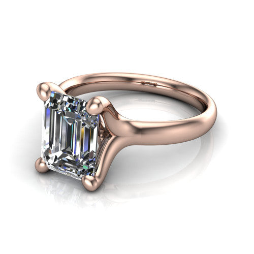 Brynlee emerald-cut classic engagement ring in 14K Rose Gold, three-quarter perspective showing the emerald-cut center diamond above a clean polished band